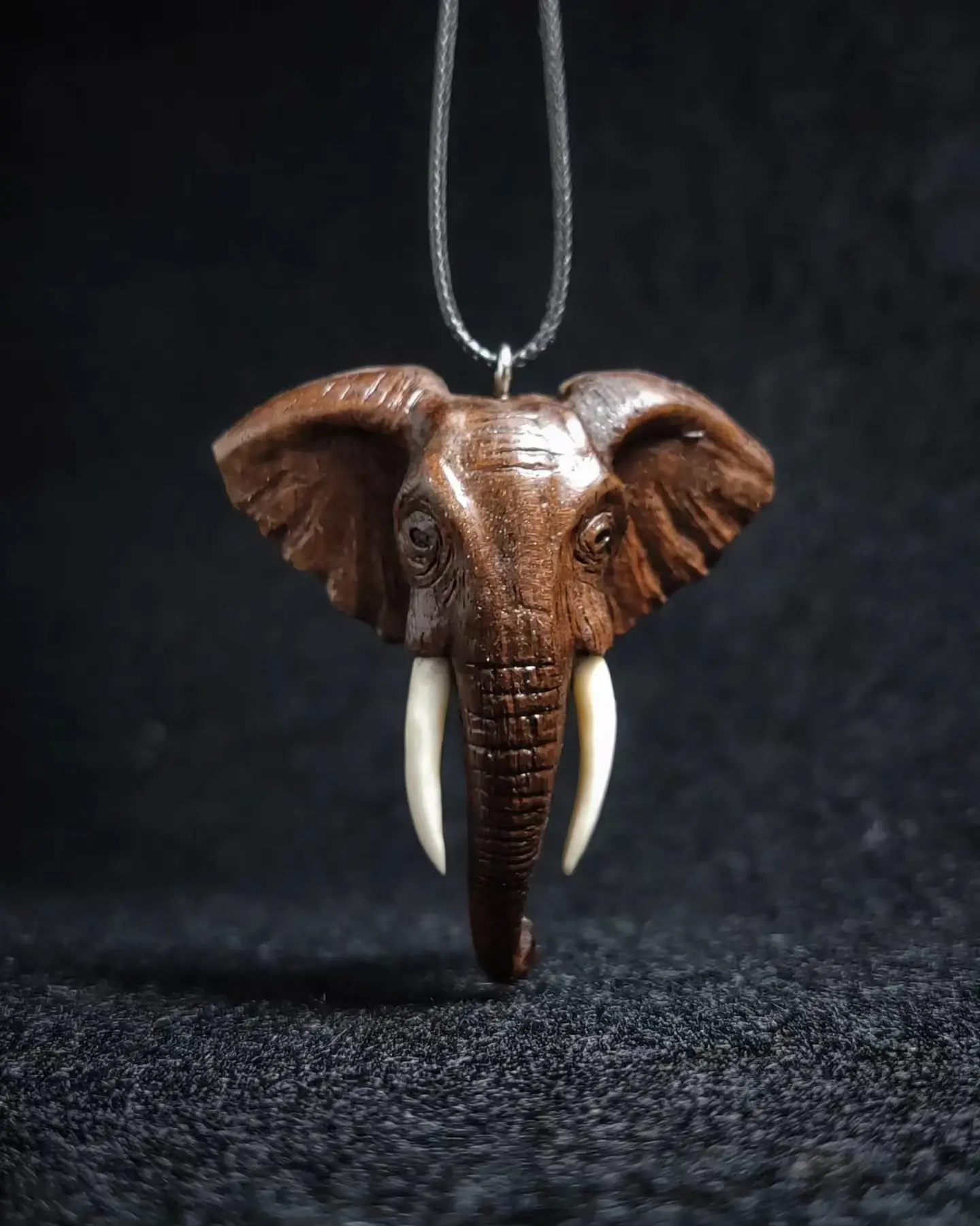 Hand‑Carved Wooden Elephants souvenir Hand‑Carved Wooden Elephants souvenir